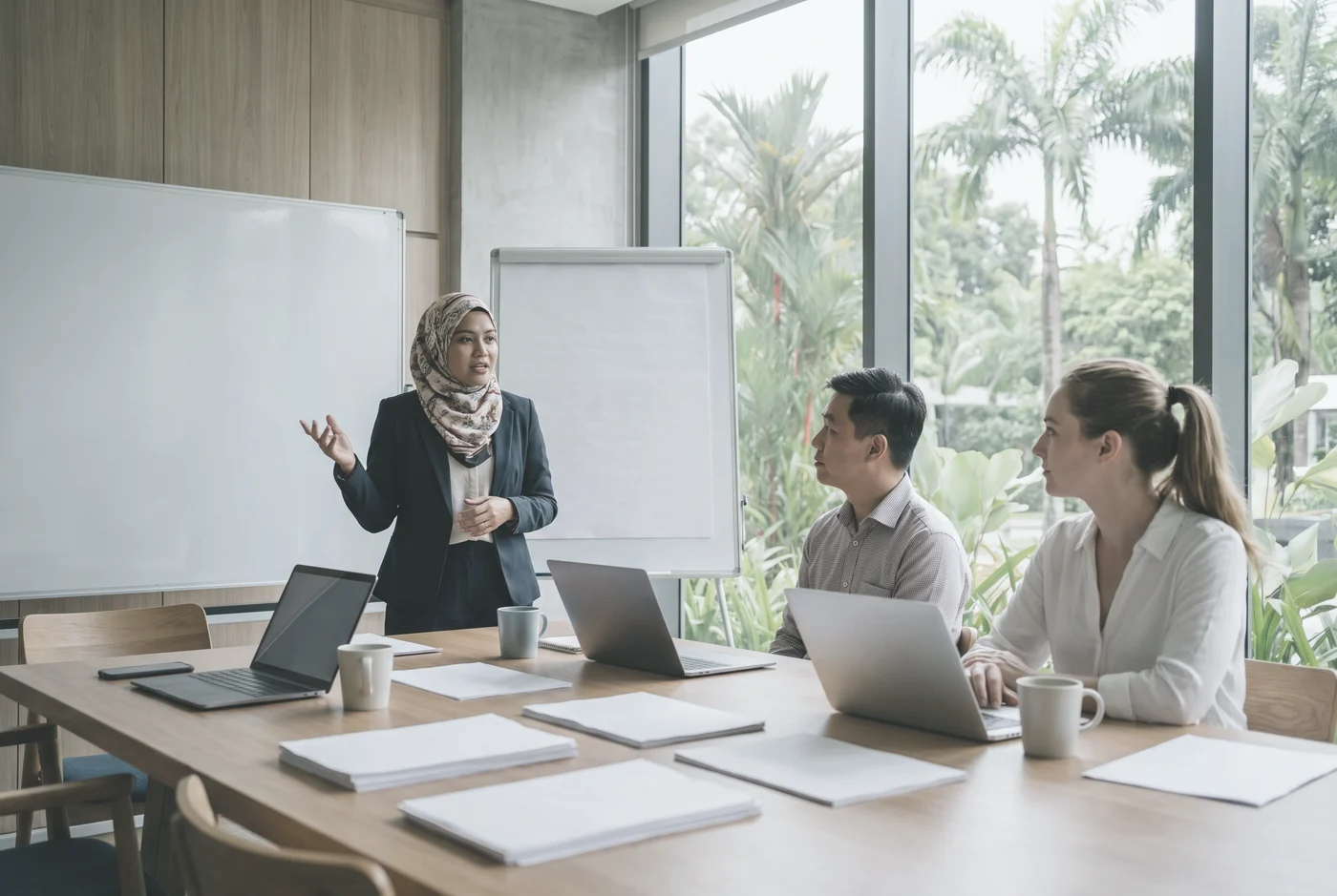 A school leadership team in discussion around a meeting table